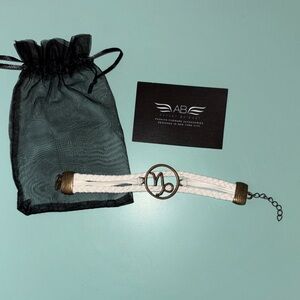 Ashley Bridget White Braided Bracelet with Bronze Charm